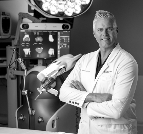 Dr. Johnson standing in operating room